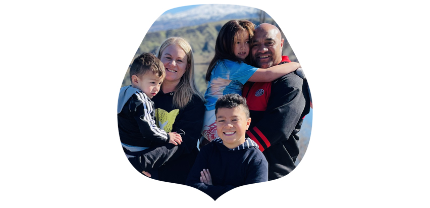 Shannon's family photo in a lions head - Pride Lands Childcare Wellington