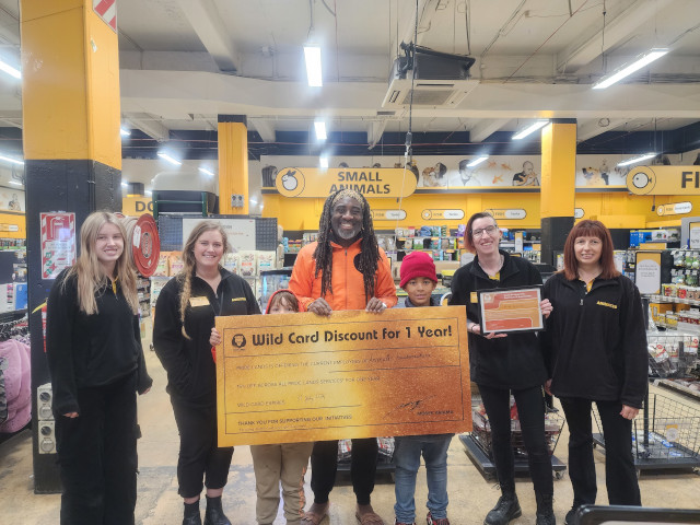 Pride Lands kids on a Social Development visit to a pet shop