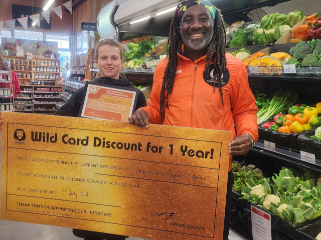 Pride Lands kids on a Social Development visit to an organic food shop