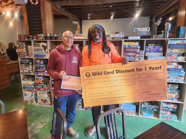 Pride Lands kids on a Social Development visit to a boardgame Café