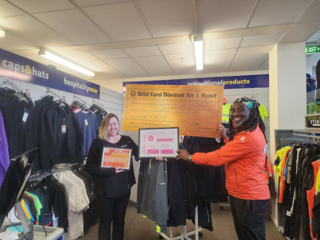 Pride Lands kids on a Social Development visit to a clothing printing and embroidery company