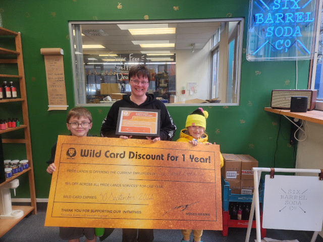 Pride Lands kids on a Social Development visit to a drinks company